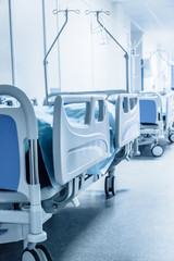 Long corridor in hospital with surgical beds. - 80332207