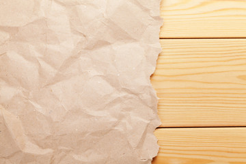 Cardboard paper over wooden background