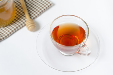 a cup of tea with honey