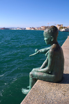 statue of the raqueros in spanish port santander.