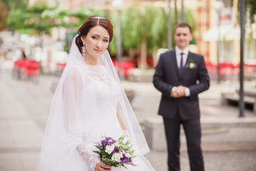 bride and groom blurred