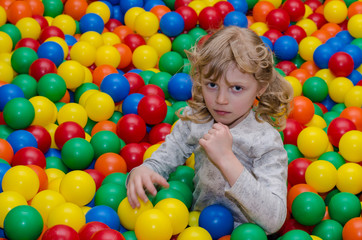Fototapeta na wymiar happy girl playing with balls
