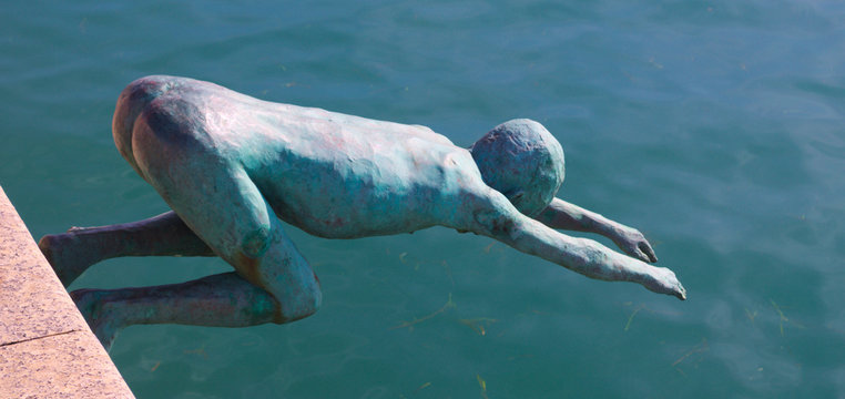 statue of the raqueros in spanish port santander.