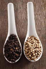 Black and white  peppercorns