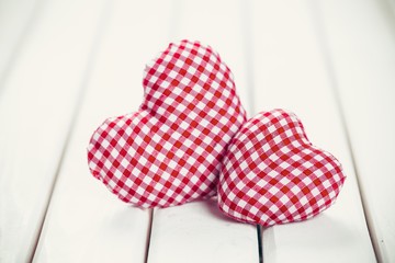 Valentin. valentines day background with two hearts on wooden