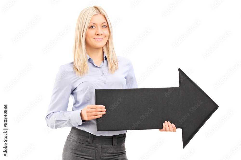 Poster blond smiling woman holding a big black arrow pointing right