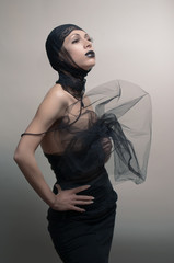 Glamoure gothic fashion woman in black dress
