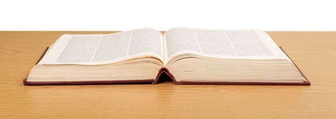 Sign. Book on wooden deck with glowing graph illustrations and