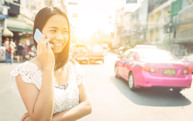 thai woman making a call