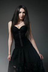 Fototapeta na wymiar Gothic woman in black dress