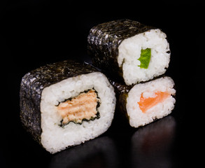 sushi over black background