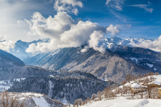 Majestic clouds over the mountain valley of Caucasus