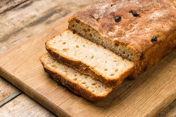 Fototapeta na wymiar Sliced loaf of homemade unleavened wheat bread