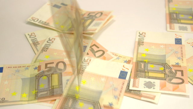 Many 50 Euros thrown on the floor