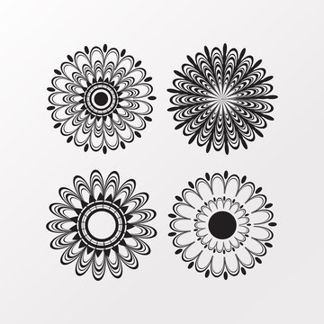 Collection of four polyensian flower designs