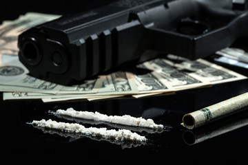 Illegal drugs , money and guns - 80349660