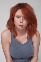 Fototapeta premium Portrait of young worrying girl