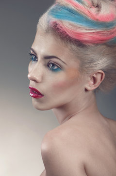 Beauty portrait with creative coloured hair-style