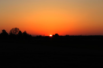 Dark summer decline above Earth