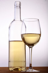 Bottle and glass of white wine