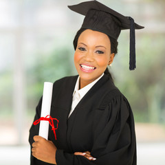 female african university graduate looking at the camera