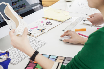 People who are working in the company that makes the shoes