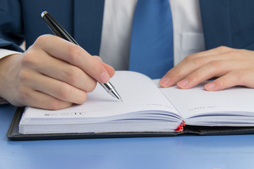 Businessman meeting to take notes