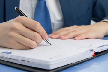 Businessman meeting to take notes