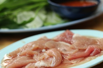Raw pork in the dish for sukiyaki.