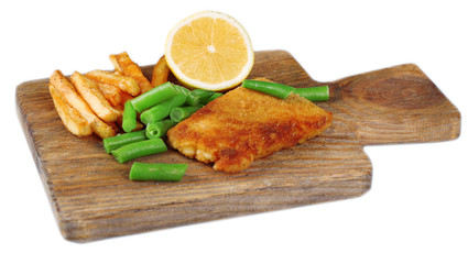 Breaded fried fish fillet and potatoes with asparagus and