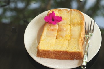 Bread, butter, topped  milk with tasty.
