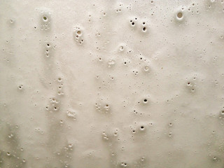 soap bubbles on car window shot from inside (by mobile phone)