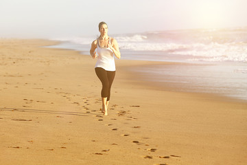 Woman running beach