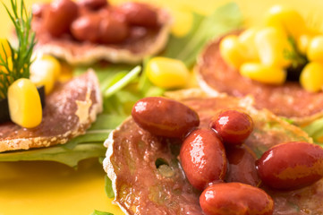 Tapas, pintxos with grilled sausages