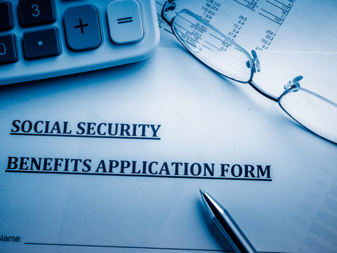 social security benefits application form on the desk.