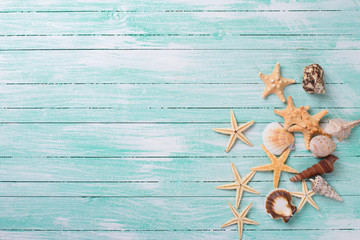 Marine items on wooden background.