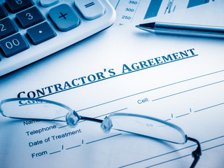 contractor's agreement on the desk.