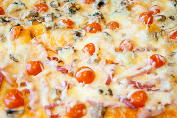 Close-up Italian vegetarian pizza on the baking tray.
