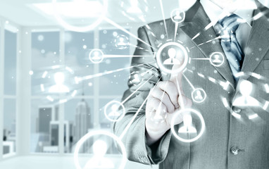 man hand pressing social media icon