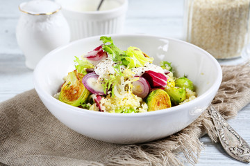Cous-cous with cabbage and sour cream