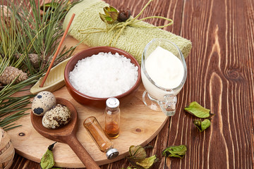 Homemade facial masks with natural ingredients, on color wooden