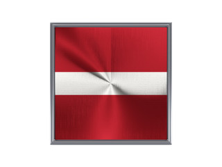 Square metal button with flag of latvia