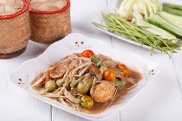 Somtum, papaya salad with pickled fish delicious food in thailan