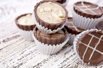 Dark chocolate on wooden background