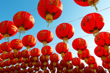 chinese lanterns over clear blue sky