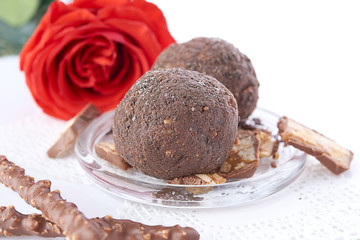 Cupcake with chocolate on wooden background