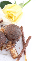 Cupcake with chocolate on wooden background
