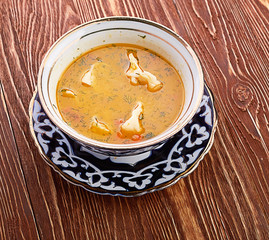 Bowl of chicken soup with vegetables and noodles