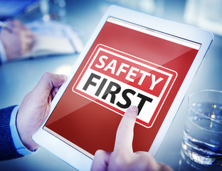 Hands Holding Digital Tablet Safety First