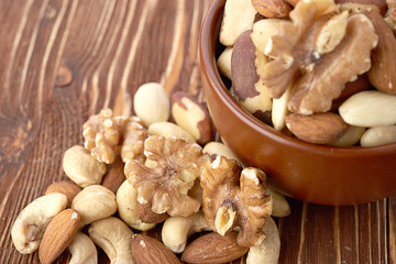 Mix nuts  on wooden  background